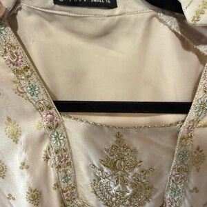 Junaid Jamshed Embroidered Cream pakistani outfit with Gold Accents